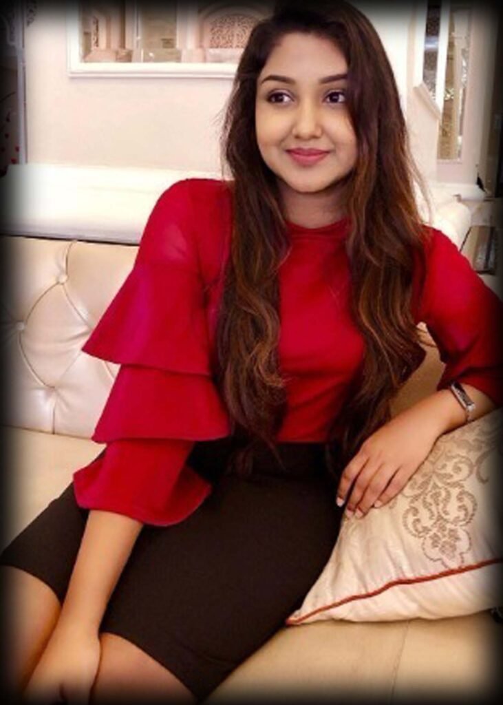 a woman sitting on a couch