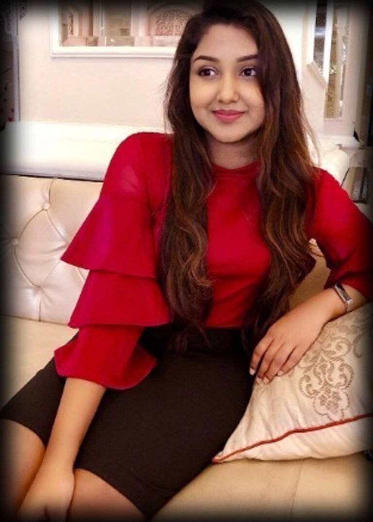 a woman sitting on a couch